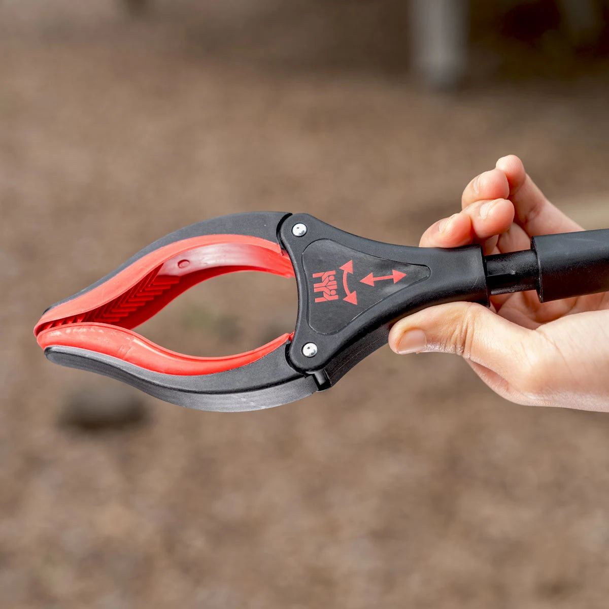 Person holding the Streetmaster Pro litter picker.