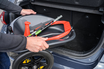 Placing litter cart into the boot of a car