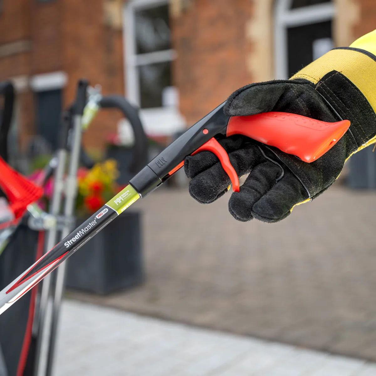 Person grabbing Streetmaster Pro gel handle.