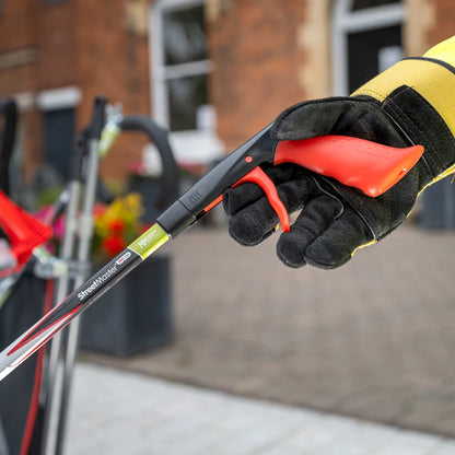 Person grabbing Streetmaster Pro gel handle.