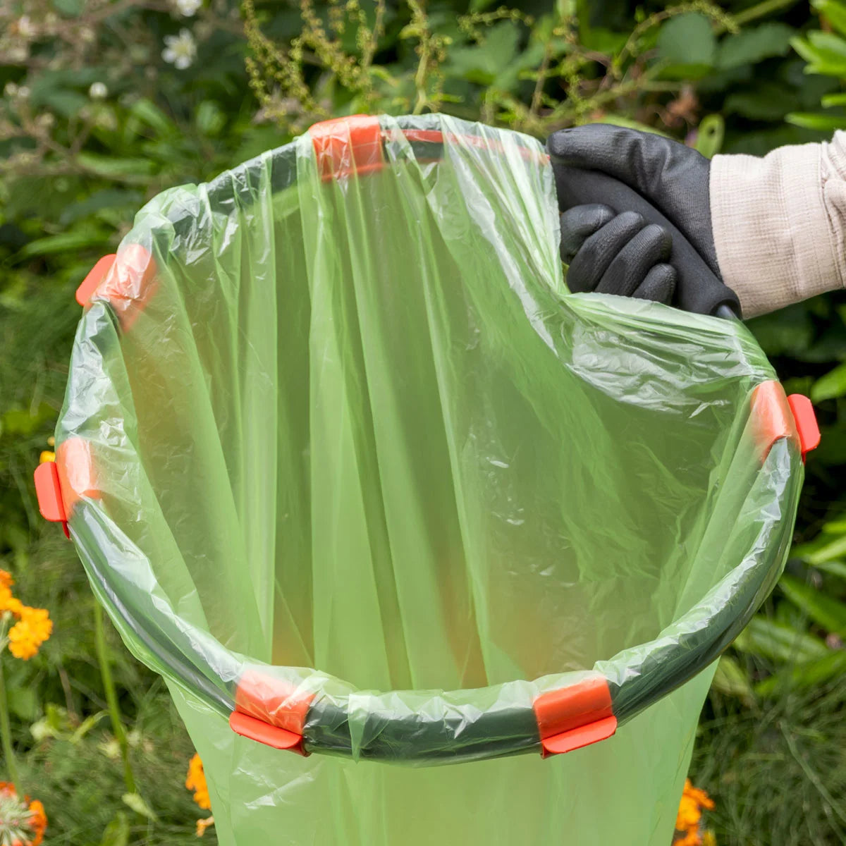 Volunteer grabbing Handi Hoop Clip Litter Hoop.